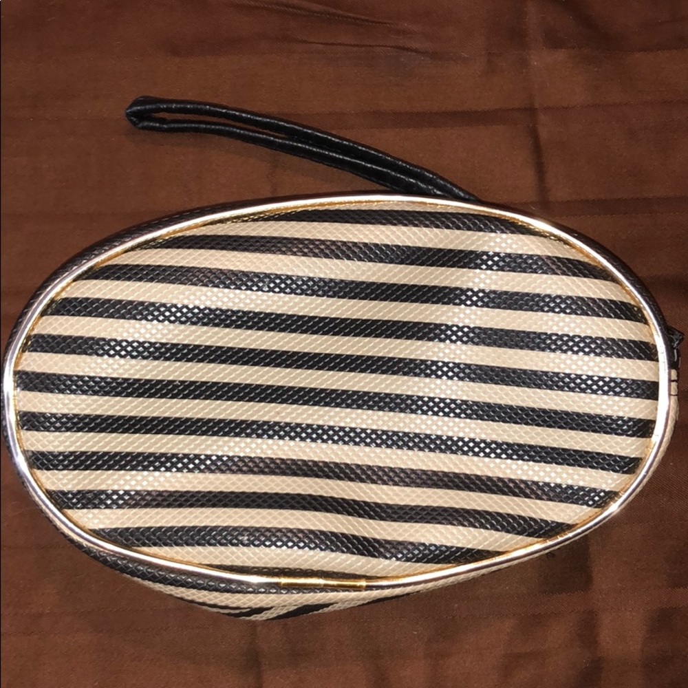 Black and cream striped cosmetic bag